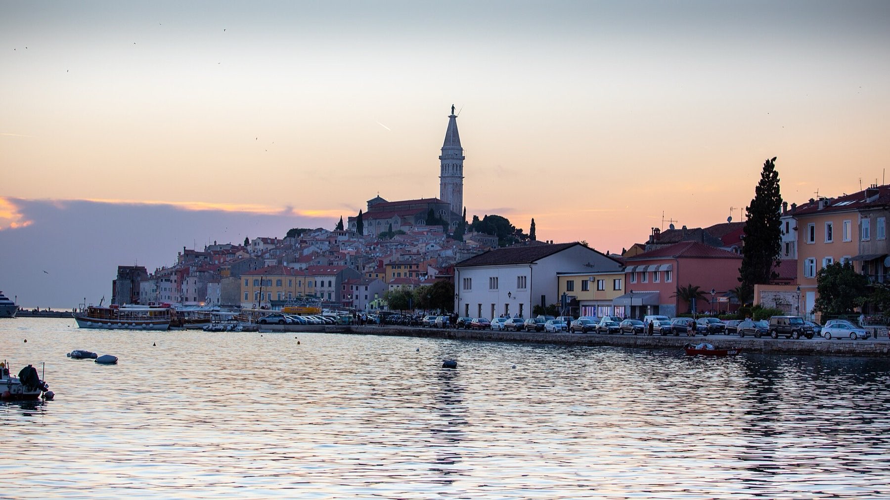 The bell tower of St. Euphemia crowning Rovinj's old town as it juts into the Adriatic