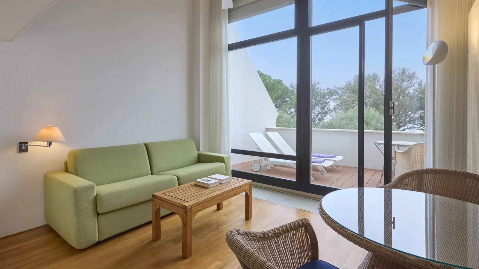 Living area and terrace in the Suite at Hotel Emilia