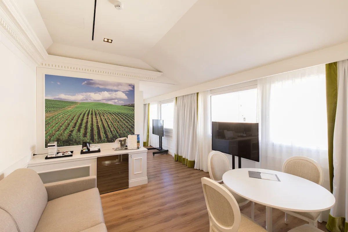 Living and sleeping area in the Wine Suite at Grand Hotel Palace Ancona