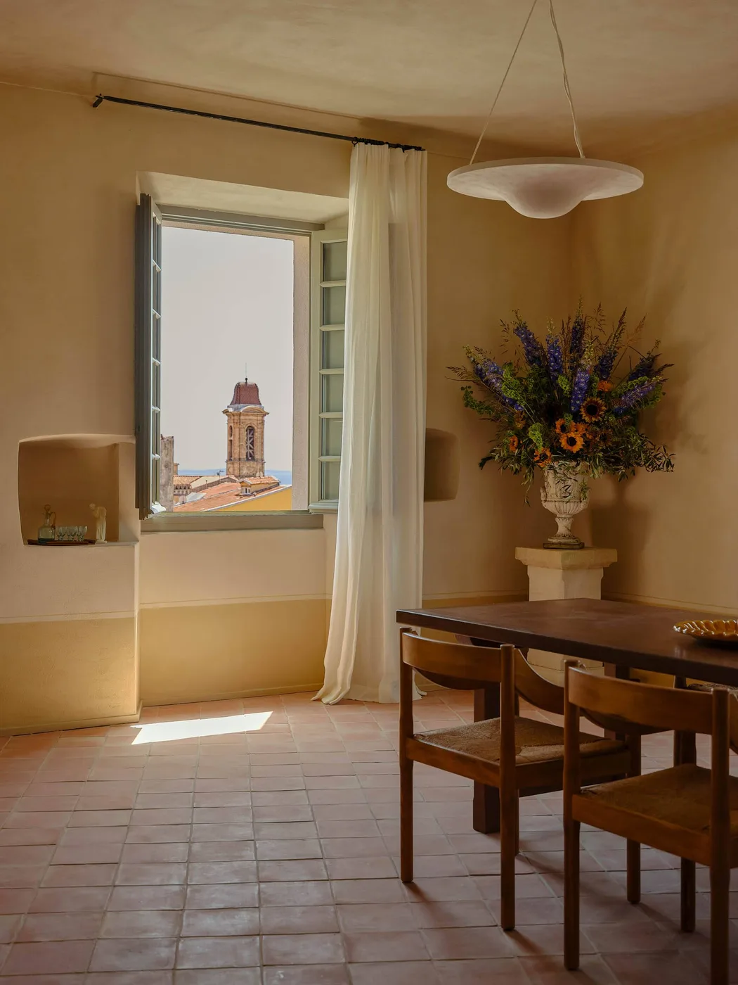 Dining and living area in La Très Grande Suite at Hôtel du Couvent