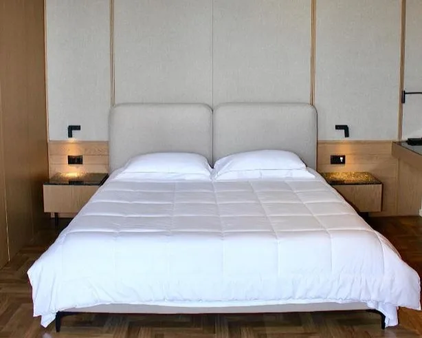 Bedroom in the Suite with Sea View at Mazarine Hotel