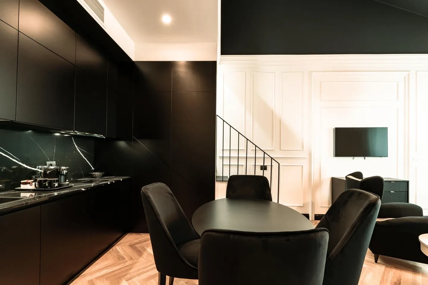 Open-plan living and kitchen area in a SeePort Suites Loft