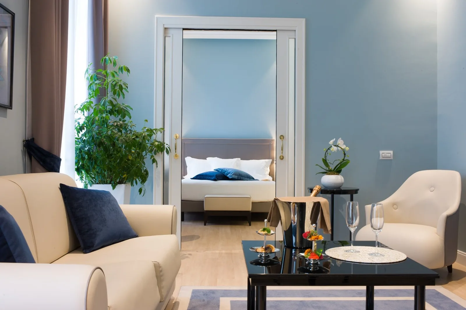 Living and sleeping areas in the Executive Suite at Turin Palace Hotel